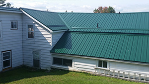 Green steel on farmhouse