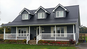Modern farmhouse with three dormers